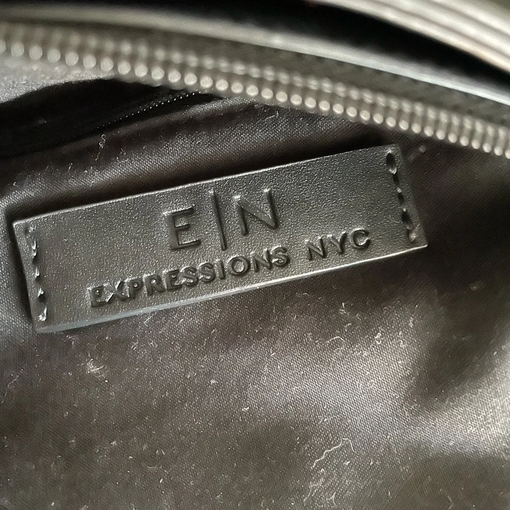 Expression NYC women’s black large wowen pattern Foux leather shoulder bag.